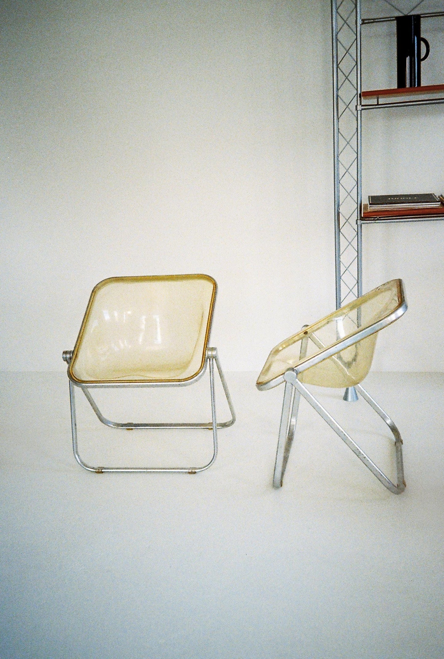 Giancarlo Piretti “Plia” Chair for Anonima Castelli, 1967 — Smoked Polycarbonate (Price Per Chair)