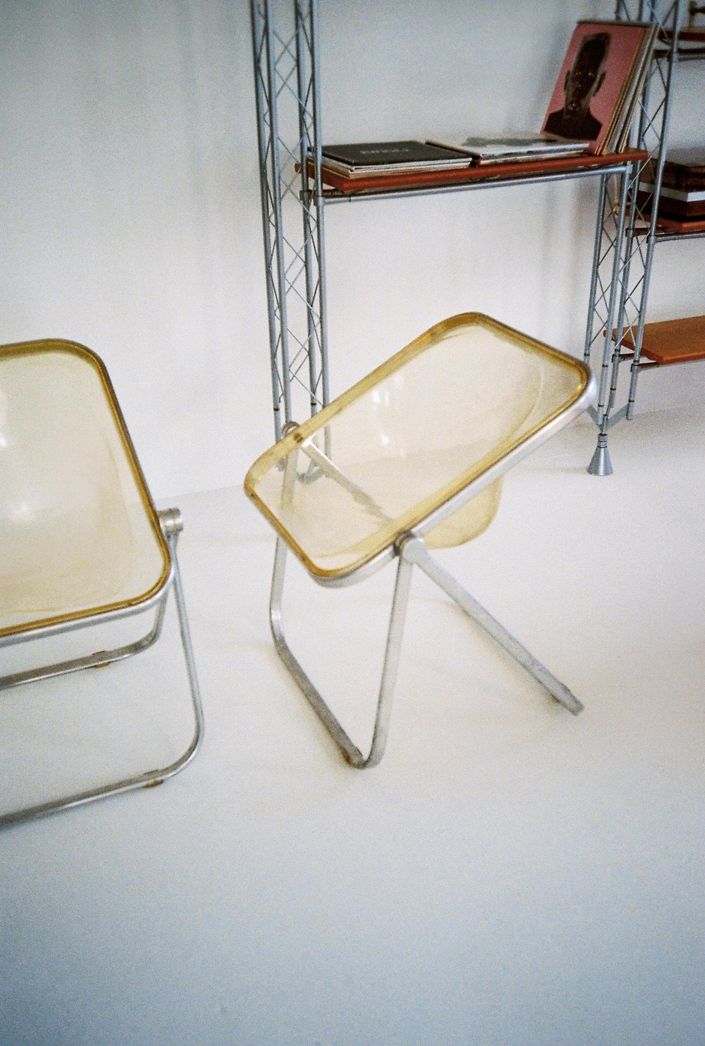 Giancarlo Piretti “Plia” Chair for Anonima Castelli, 1967 — Smoked Polycarbonate (Price Per Chair)