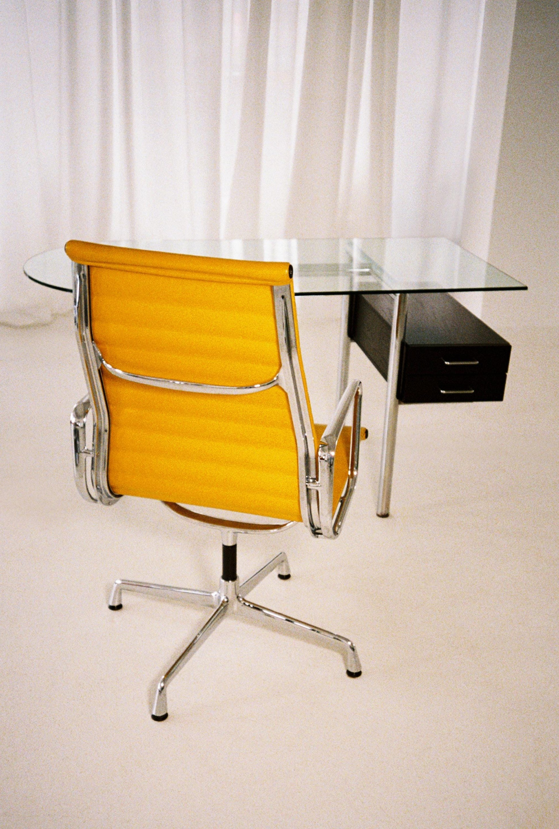 Vintage Eames Aluminum & Leather Chair EA117